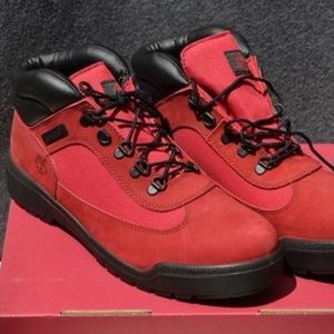 red and black timberland field boots